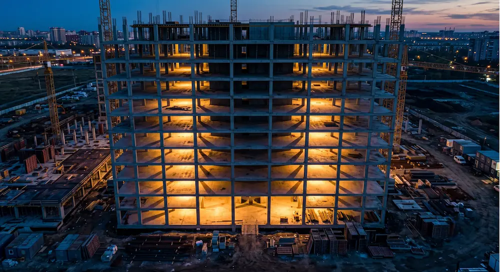 ESG flooring specification in large scale commercial construction project at dusk